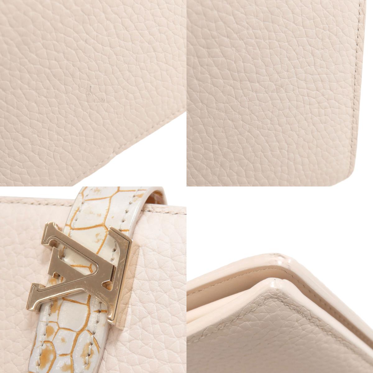 LOUIS VUITTON ルイヴィトン ヴェルティカルウォレット 長財布（小銭入れあり） トリヨン レディース 中古