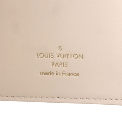 LOUIS VUITTON ルイヴィトン ヴェルティカルウォレット 長財布（小銭入れあり） トリヨン レディース 中古