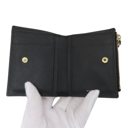 マルニ ロゴ 二つ折り財布（小銭入れあり） 中古 商品画像5