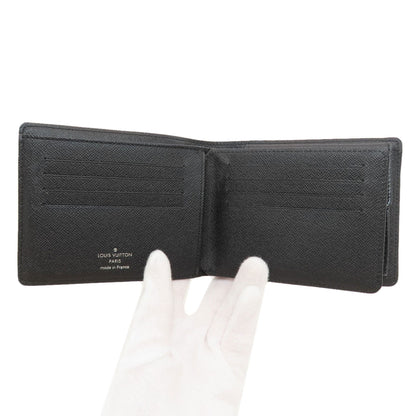 ルイヴィトン N63074 ポルトフォイユ・フロリン 二つ折り財布（小銭入れあり） 中古 商品画像5